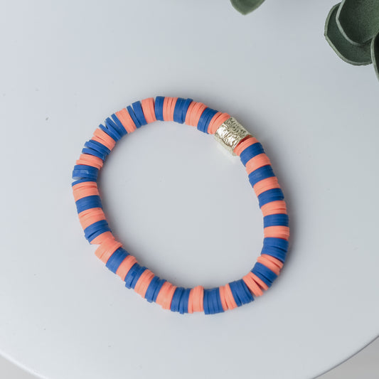 Kendra Spirit Silicone Disc Stretch Bracelets in Orange/Royal