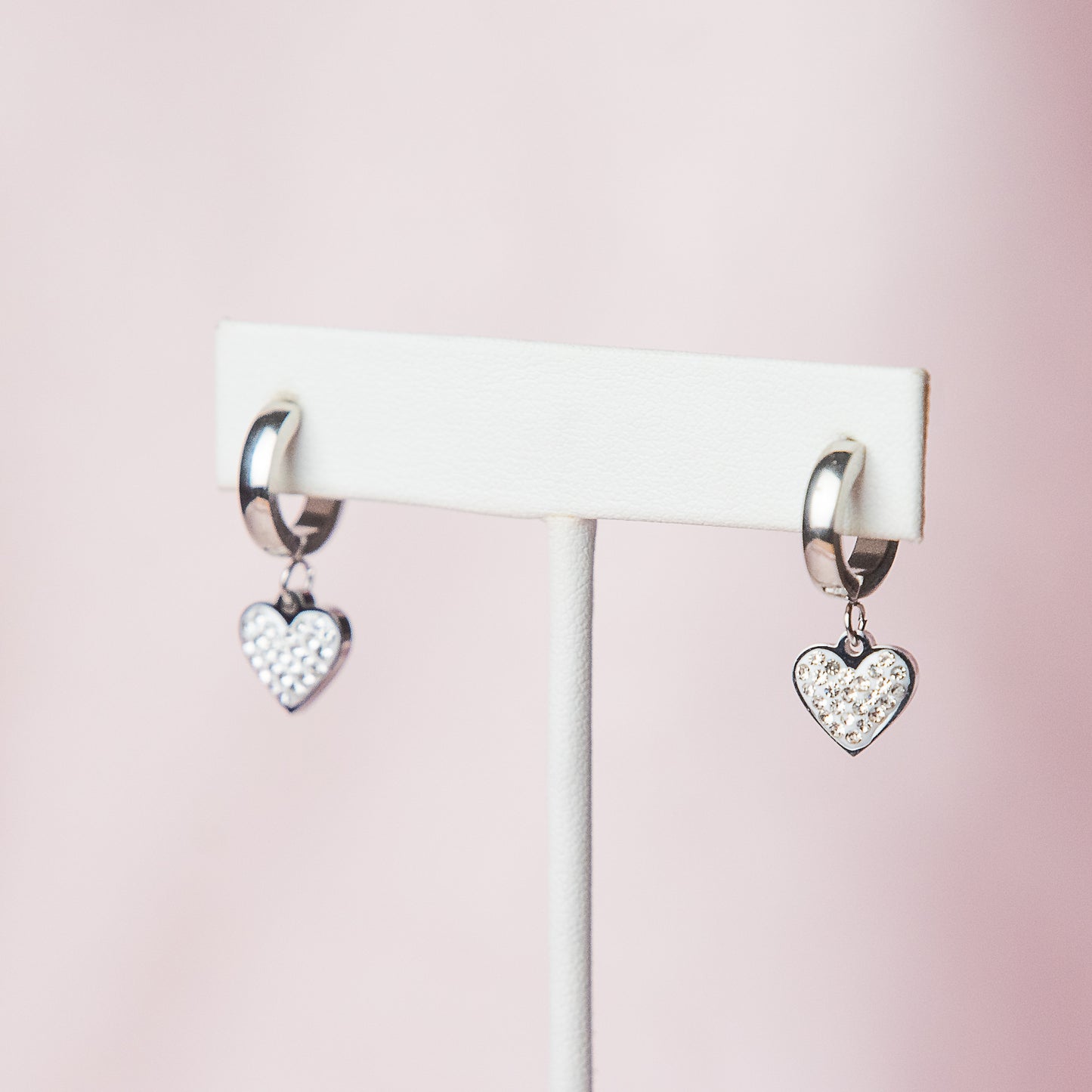 Pave Rhinestone Heart Dangle Huggie Earrings in Silver